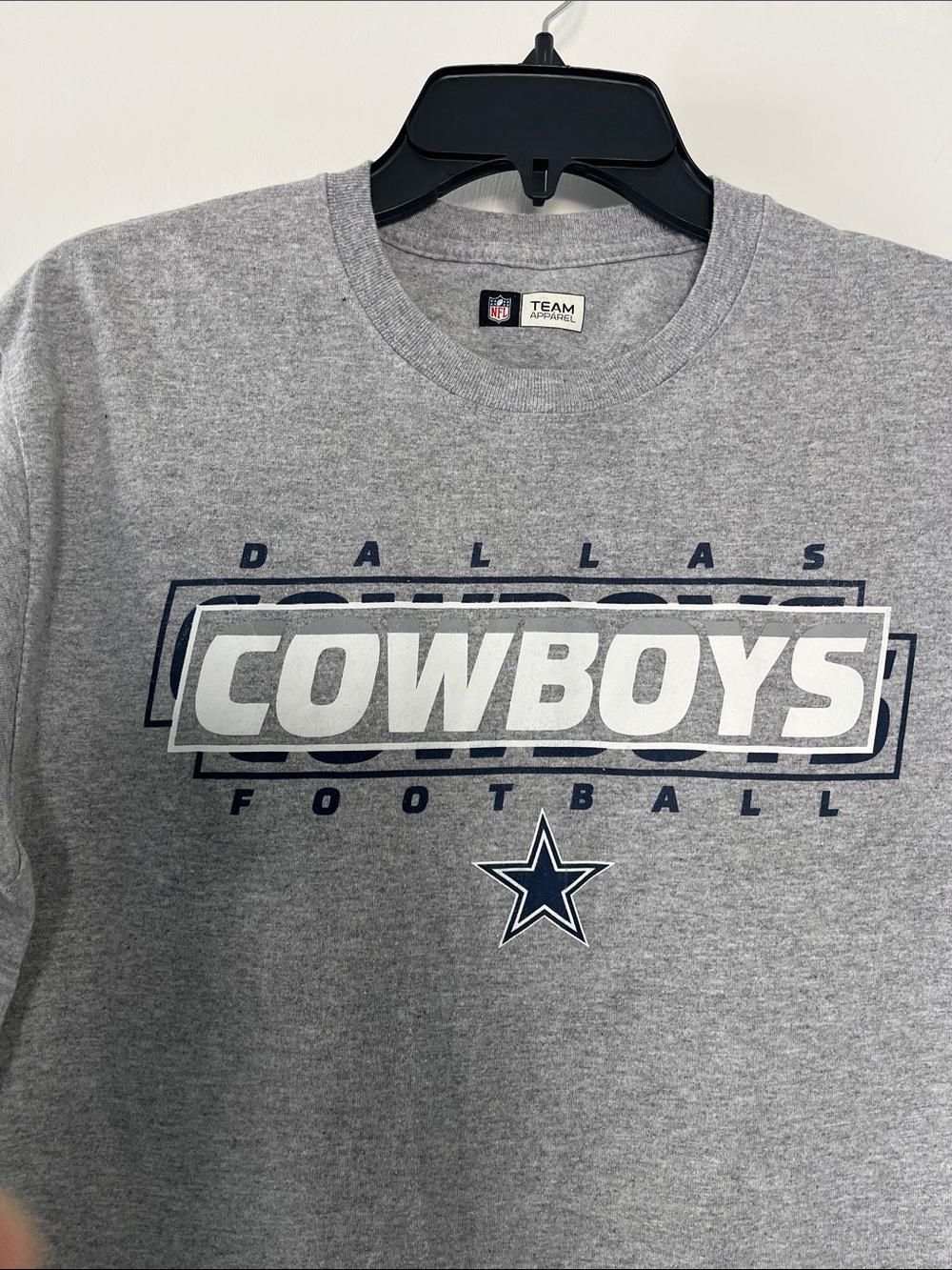 NFL Dallas Cowboys Gray and Navy Graphic Tee . A little tiny hole see pic